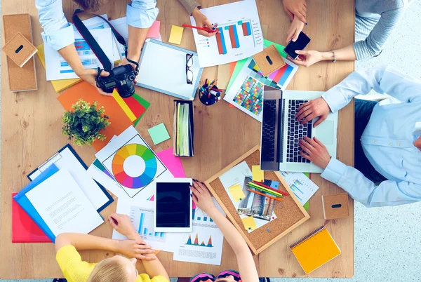 Business people sitting and discussing at business meeting, in office — Stock Photo, Image