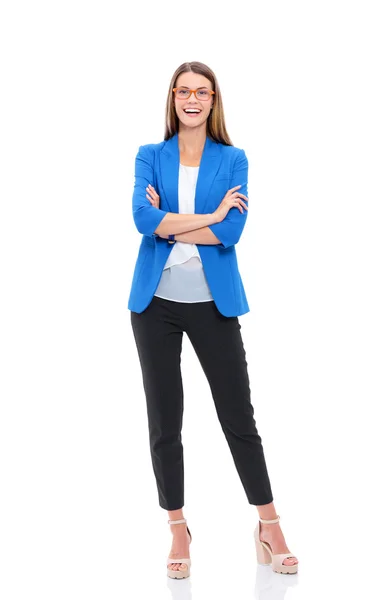 Portrait of a confident young woman standing isolated on white background. — Stock Photo, Image