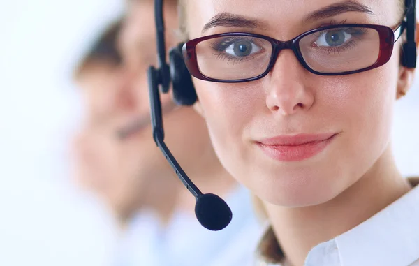 Attractive positive young businesspeople and colleagues in a call center office — Stock Photo, Image