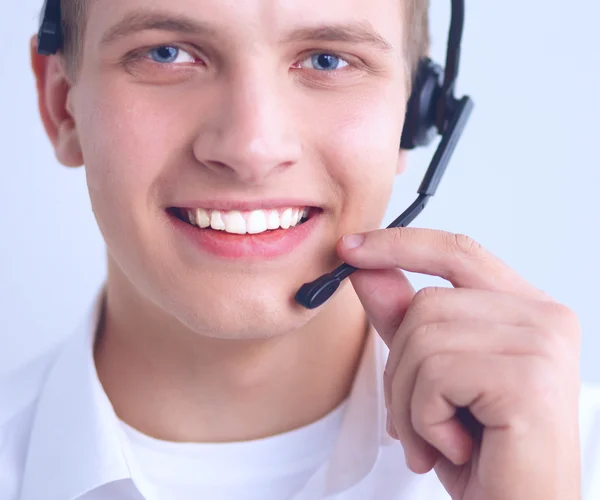 Operatore di assistenza clienti con auricolare su sfondo bianco — Foto Stock