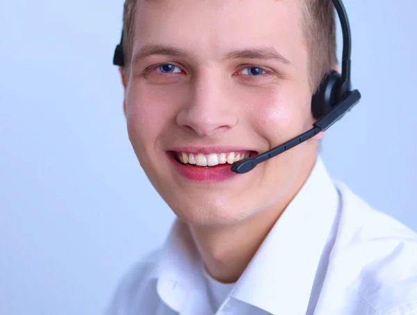 Operador de atención al cliente con auriculares aislados sobre fondo blanco —  Fotos de Stock