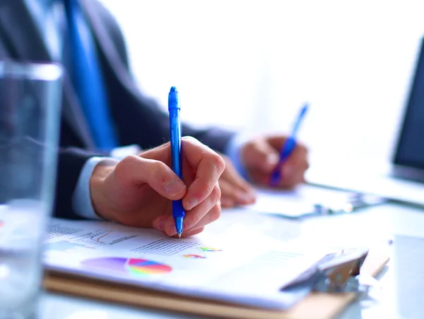 Businesspeople sitting on the desk on office — Stock Photo, Image