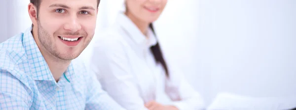 Business people sitting and discussing at business meeting, in office — Stock Photo, Image