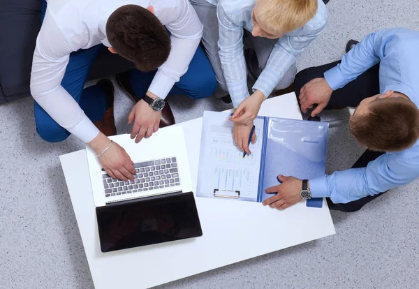 Business people sitting and discussing at business meeting, in office — Stock Photo, Image