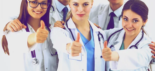 Porträtt av läkare laget visar tummen upp — Stockfoto