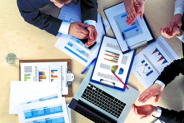 Business people sitting and discussing at business meeting, in office — Stock Photo, Image