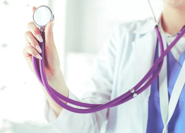 Smiling medical doctor woman with stethoscope in hospital — Stock Photo, Image