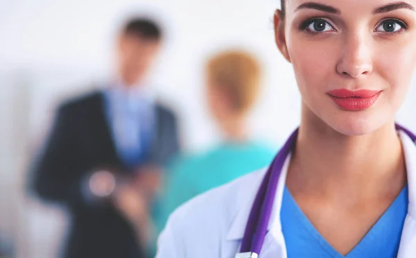 Woman doctor standing at hospital — Stock Photo, Image