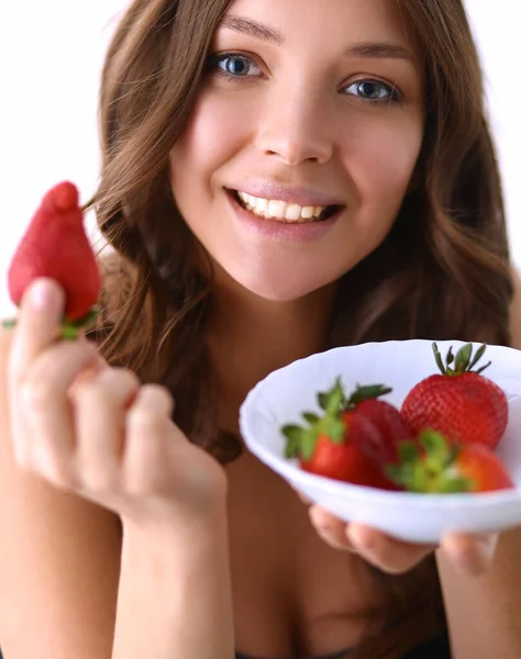 Smiling woman eating strawberry. Close up female face portrait — Stock Photo, Image