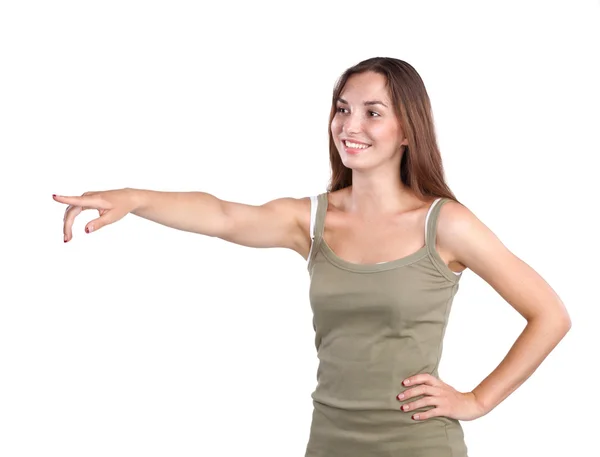 Portrait of a smiling young woman pointing up — Stock Photo, Image