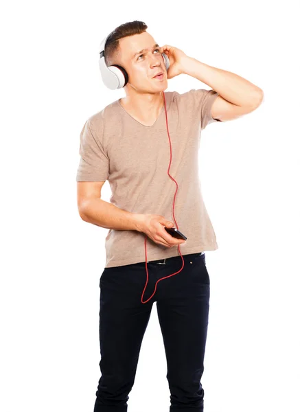 Jongeman draagt een koptelefoon — Stockfoto
