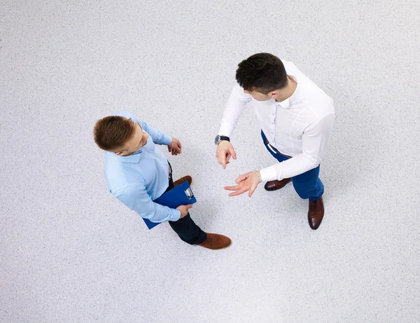 Visão geral das pessoas que têm reunião de negócios — Fotografia de Stock