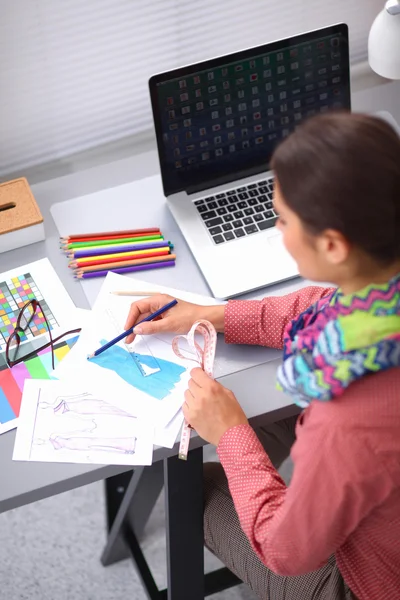 Modern young fashion designer working at studio. — Stock Photo, Image