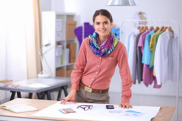 Modern young fashion designer working at studio. — Stock Photo, Image