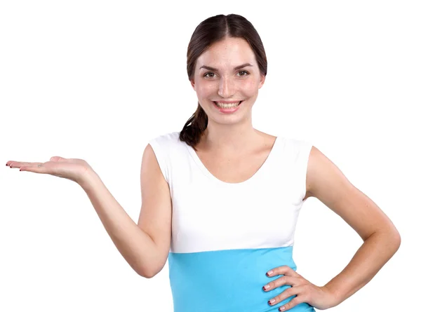 Retrato de una joven sonriente señalando hacia arriba — Foto de Stock