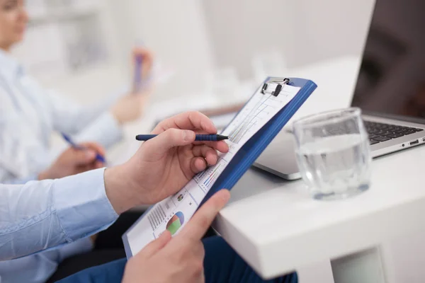 Close-up of businessman explaining a financial plan to colleagu — Stock Photo, Image