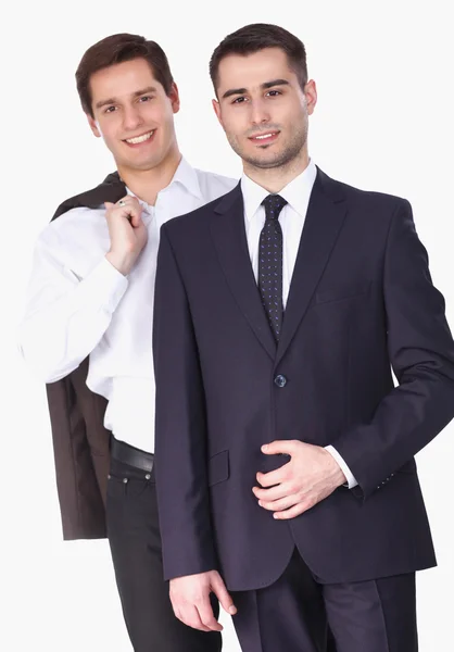 Twee jongemannen permanent, geïsoleerd op witte achtergrond — Stockfoto