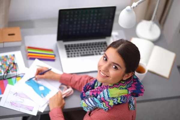 Modern young fashion designer working at studio. — Stock Photo, Image