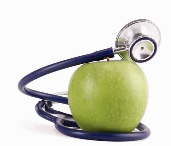 Stethoscope and green apple isolated on white background , — Stock Photo, Image