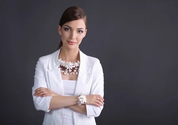 Portrait of young woman with beads, isolated on grey background — ストック写真