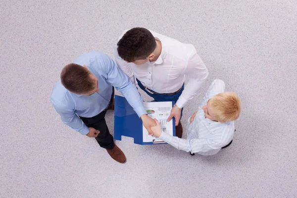 Overhead view of people having business meeting, isolated on white background — Stock Photo, Image