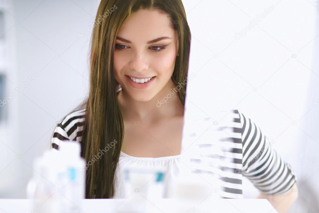 Beautiful young woman in shop