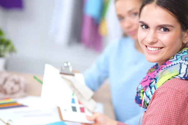 Modern young fashion designer working at studio. — Stock Photo, Image