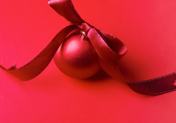 Red christmas ball, isolated on red background. — Stock Photo, Image