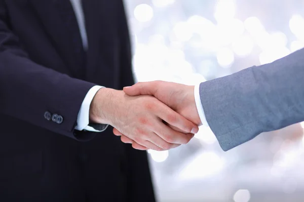 Businessmen shaking hands, isolated on white. — Stock Photo, Image