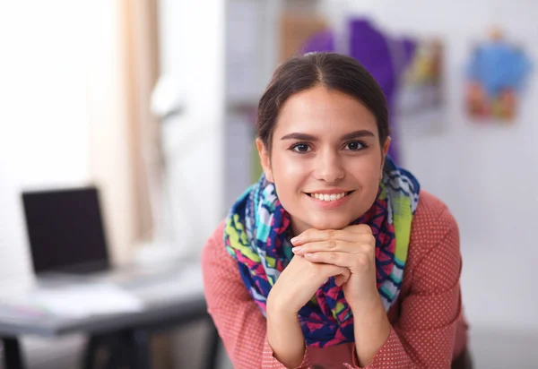 Modern young fashion designer working at studio. — Stock Photo, Image