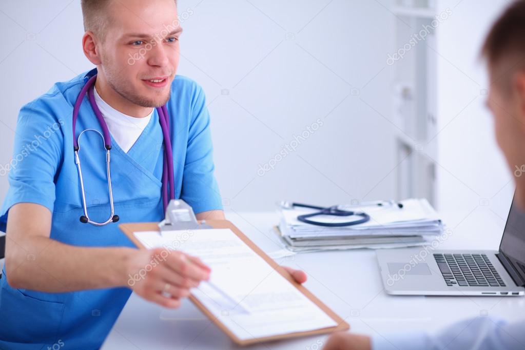 Doctor male giving patient folder with  paper in her office, isolated