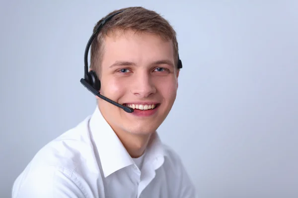 Opérateur de support client avec un casque isolé sur fond blanc — Photo
