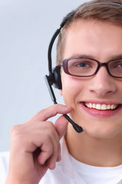 Customer support operator with a headset isolated on white background — Stock Photo, Image