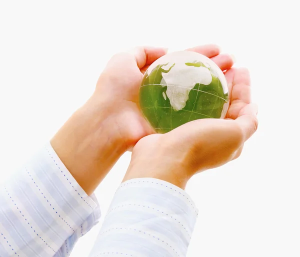 Hands holding a green earth, isolated on white background — Stock Photo, Image