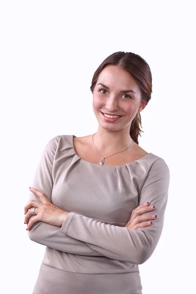 Mujer joven de pie, aislada sobre fondo blanco — Foto de Stock