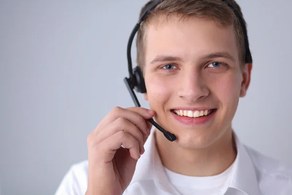 Operatore di assistenza clienti con auricolare isolato su sfondo bianco — Foto Stock