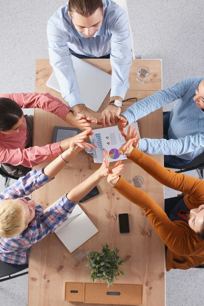 Business team with hands together - teamwork concepts — Stock Photo, Image