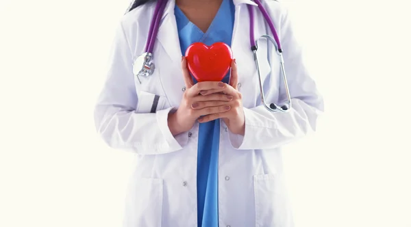 Médico com estetoscópio segurando coração, isolado em fundo branco — Fotografia de Stock