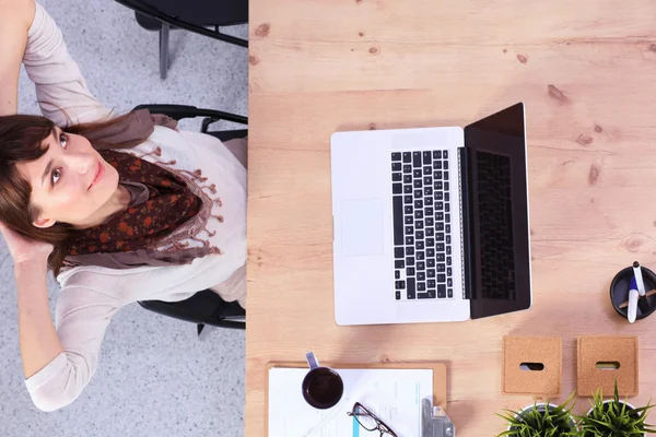 Business woman relaxing with  hands behind her head and sitting on a chair — Stock Photo, Image