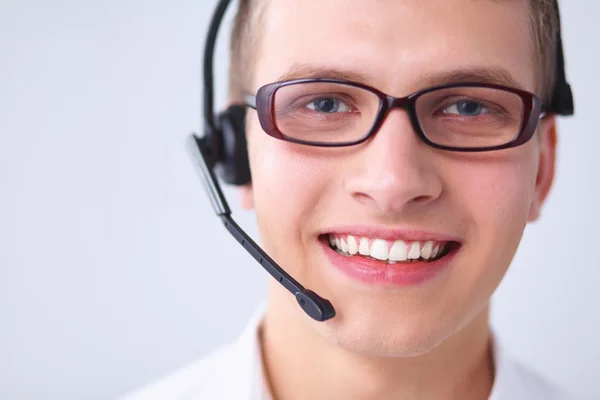 Customer support operator with a headset on white background — Stock Photo, Image