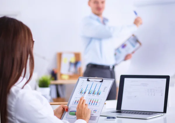 Business people sitting and discussing at business meeting, in office — Stock Photo, Image