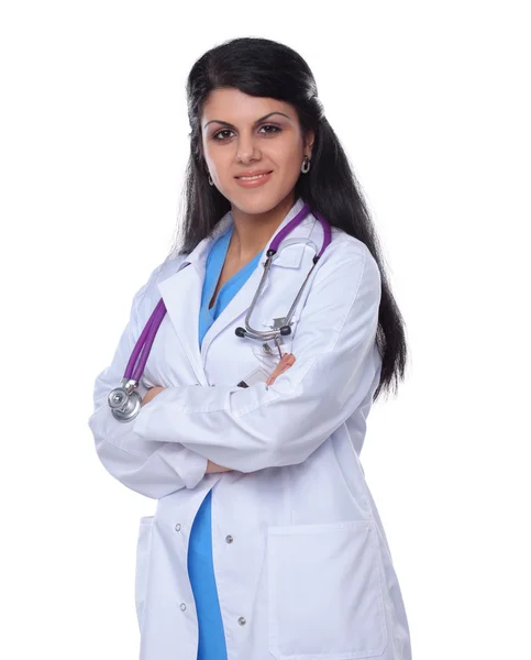 Doctor woman with stethoscope standing near wall Stock Image