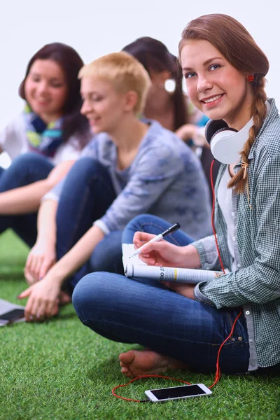 Group of young student using laptop together — Stock Photo, Image