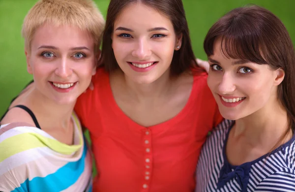 Portrait of three young women, standing together — Stock Photo, Image