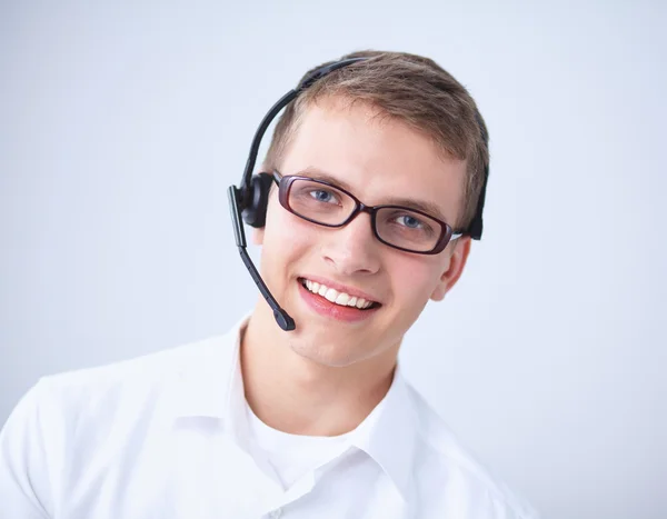 Customer support operator with a headset on white background — Stock Photo, Image