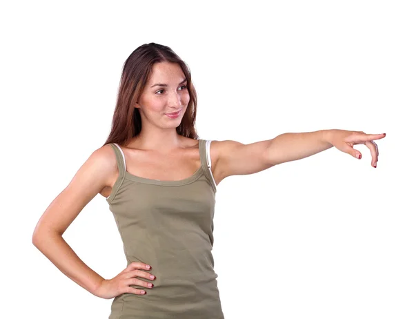 Portrait of a smiling young woman pointing up — Stock Photo, Image