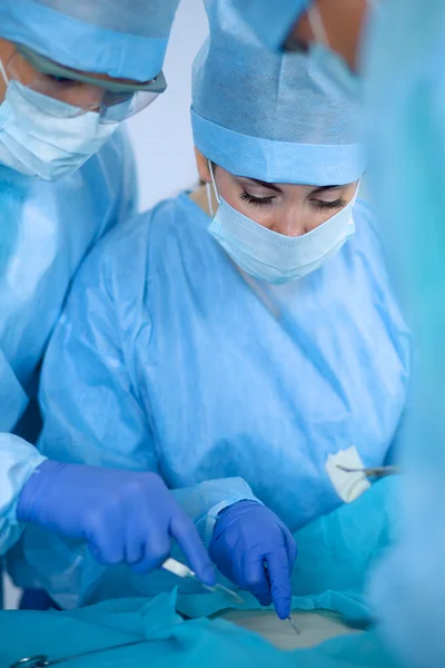 Squadra di chirurgia in sala operatoria — Foto Stock