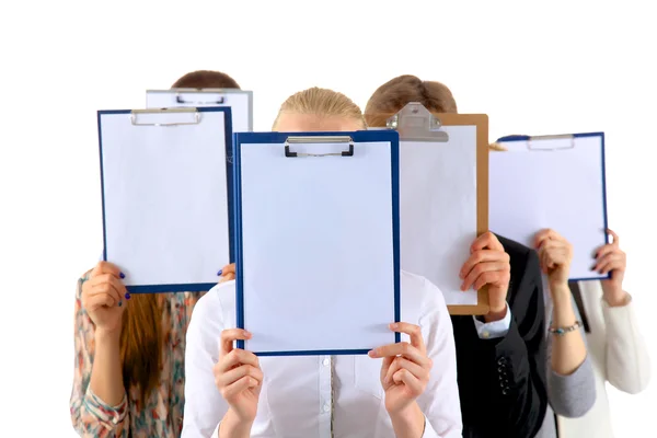 Team of businesspeople holding a folders near face isolated on white background — Stock Photo, Image