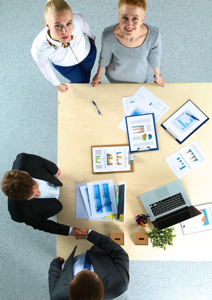 Business people handshake, sitting at the table — Stock Photo, Image