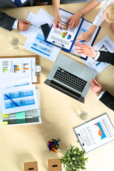 Business people sitting and discussing at business meeting, in office — Stock Photo, Image